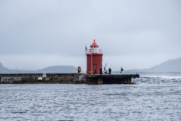 lighthouse on the shore of the sea