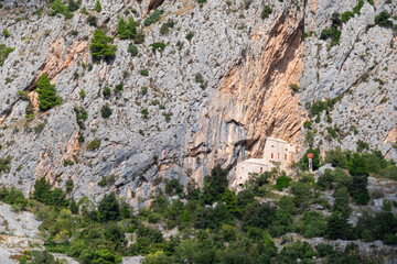Scenic view of ancient fortress build into massive rock formation in village Kotisina near...