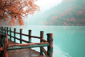Zelfklevend Fotobehang dock leading to a lake is foggy © AAA