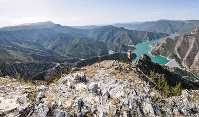 Blue green Kozjak lake surrounded by hills in the mountains of Macedonia. Large artificial lake....
