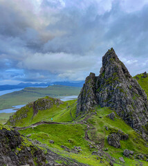 Fototapeta na wymiar AERIAL: Majestic basalt rock towers on the way to the famous Old Man of Storr