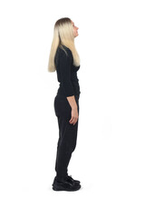 side view of a portrait of a blonde woman standing looking up on white background