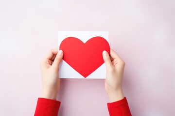 Red heart-shaped Valentine card in a white envelope. - obrazy, fototapety, plakaty