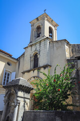 Church of Saint Andre and Saint Trophime in Lourmarin town, Provence region in France - obrazy, fototapety, plakaty