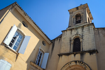 Fototapeta na wymiar Church of Saint Andre and Saint Trophime in Lourmarin town, Provence region in France
