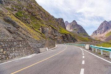 The beautiful scenery of snow-capped mountains along the Duku Highway in Xinjiang, China