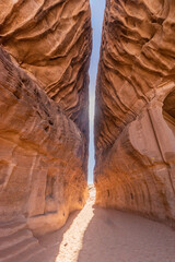 Narrow pasage through Jabal Ithlib mountain, the Siq, at Hegra (Mada'in Salih) site near Al Ula, Saudi Arabia