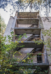 Fototapeta na wymiar Apartment house in Pripyat ghost city in Chernobyl Exclusion Zone, Ukraine