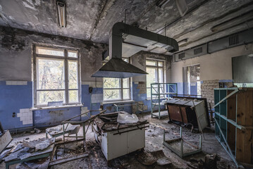 Kitchen in hospital in Pripyat ghost city in Chernobyl Exclusion Zone, Ukraine - obrazy, fototapety, plakaty