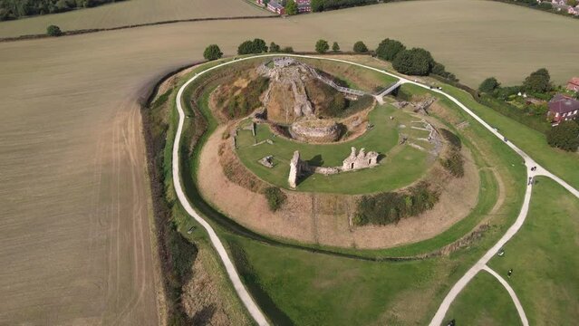 Aerial video shot of castle ruins Sandal in Wakefield UK and people relaxing and have a good time, Various recording angles