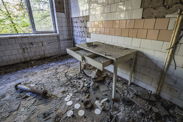 Desk in Hospital MsCh-126 in Pripyat ghost city in Chernobyl Exclusion Zone, Ukraine