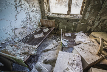 Patient room in maternity ward of hospital MsCh-126 in Pripyat ghost city in Chernobyl Exclusion...
