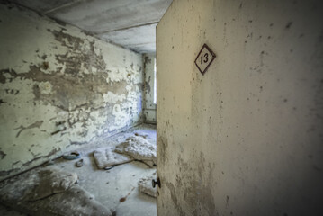 Patient room in Hospital MsCh-126 in Pripyat ghost city in Chernobyl Exclusion Zone, Ukraine - obrazy, fototapety, plakaty