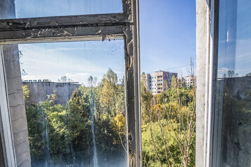 View from Hospital MsCh-126 in Pripyat ghost city in Chernobyl Exclusion Zone, Ukraine - obrazy, fototapety, plakaty