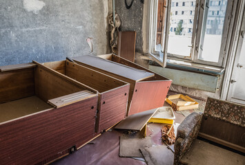 Flat in abandoned 16-story residential building in Pripyat ghost city in Chernobyl Exclusion Zone,...