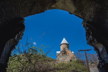 View from ruins of small chapel next to Ananuri Castle over the Aragvi River in Dusheti...