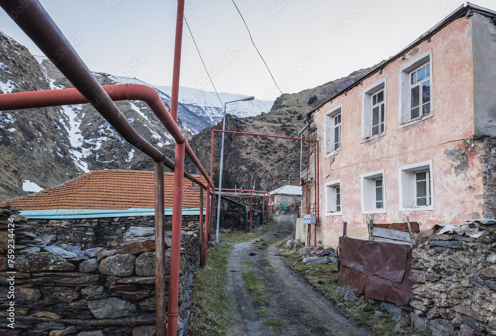 Poster Gergeti village near Stepantsminda, formerly Kazbegi in Mtskheta-Mtianeti region, Georgia