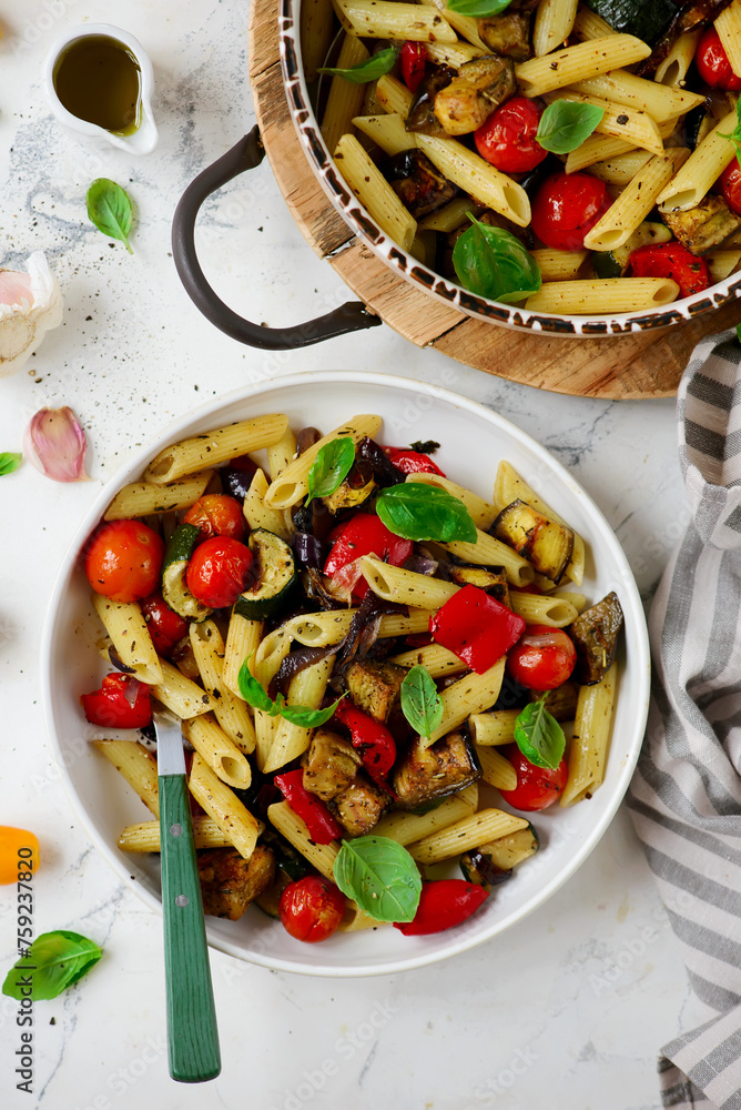 Sticker Roasted vegetables pasta with zuccini, tomato  and Basil  .top veiw.selective focus