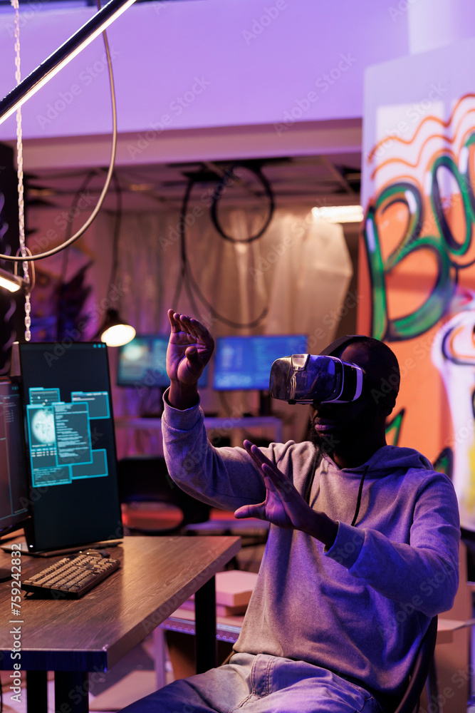 Poster hacker wearing vr helmet doing illegal activities and breaching online security systems in metaverse
