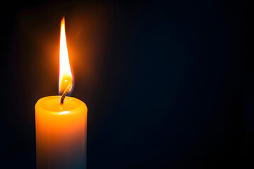 One lit candle on dark background - 759249808