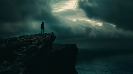 A depressed person standing edge of the cliff - obrazy, fototapety, plakaty