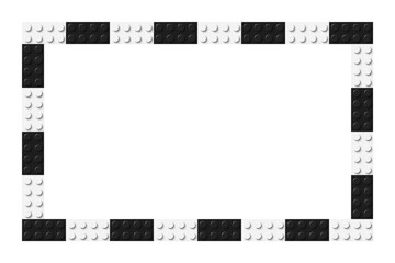 Simple frame composed of black and white toy blocks. Black and white brick banner. Abstract vector background