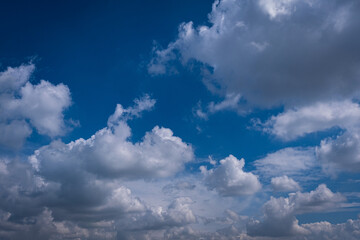 white clouds in the blue sky. cumulus.