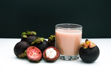 Mangosteen juice is made from the mangosteen fruit and its seeds which are blended until smooth....