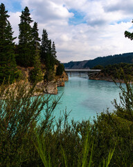 a bridge over unique turquoise river in rakaia gorge; canterbury, new zealand south island;
