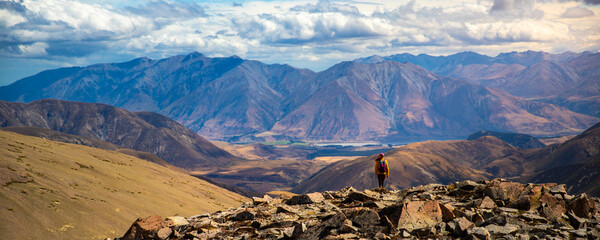 brave hiker climbing a steep, highly challenging track to Castle Hilll Peak in Korowai/Torlesse...