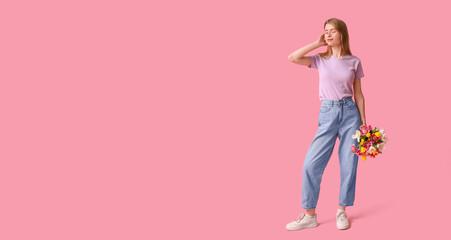 Pretty young woman with bouquet of beautiful tulips on pink background