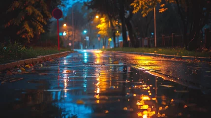 Fotobehang A wet road with street lights and a tree in the background, AI © starush