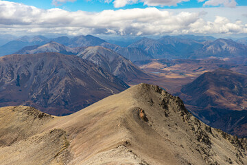 panorama of southern alps in torlesse tussocklands national park as seen from the top of castle...