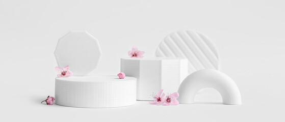 Decorative podiums and flowers on white background
