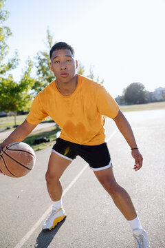 Dribble portrait of serious baller.
