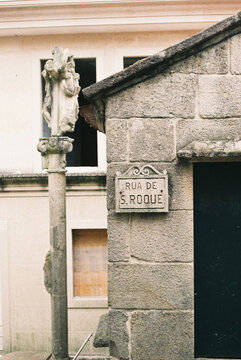 Old block wall with house label in Combarro Galicia Spain