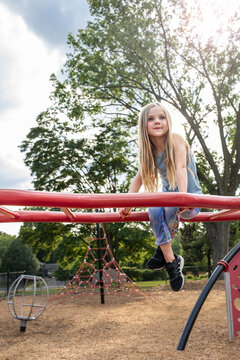 Sitting on the monkeybars