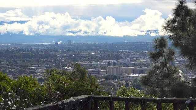 CALIFORNIA - 2.22.2024 - Excellent time-lapse footage of rain clouds growing over a city in southern California.