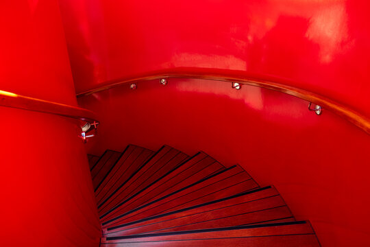 Glowing red stairwell on a cruise ship 