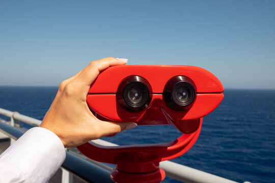Viewpoint red binoculars on a cruise ship