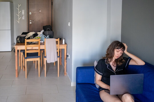 A female working on a laptop at home