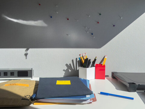 Office Supplies still life on office Cubicle desk and pen and pencil  
