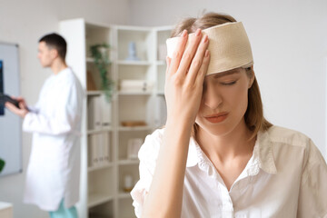 Young woman with brain concussion at neurologist's office, closeup