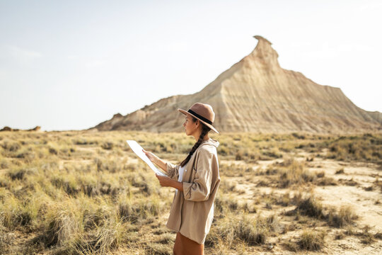 young woman traveler in the desert of bardenasreales