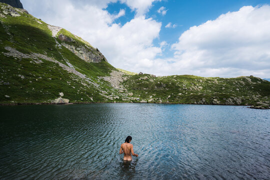 Athletic Naked Man In Mountain Lake