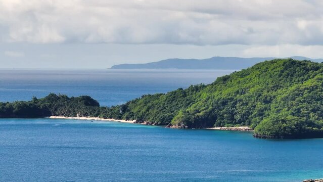 White sand beach in Tropical Island. Blue sky and clouds. Philippines.