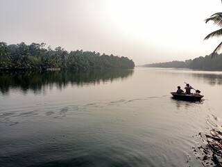 Exploring the majestic backwaters of Kerala India on a man powered boat.
