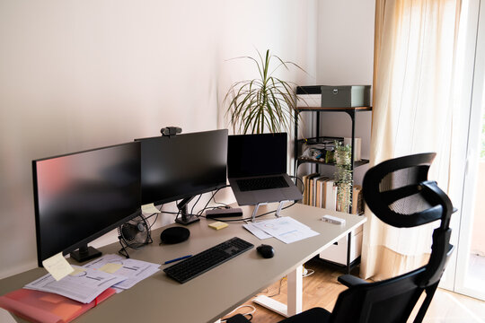 Desk With Computers And Documents At Home
