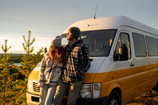 Happy couple camper van in nature