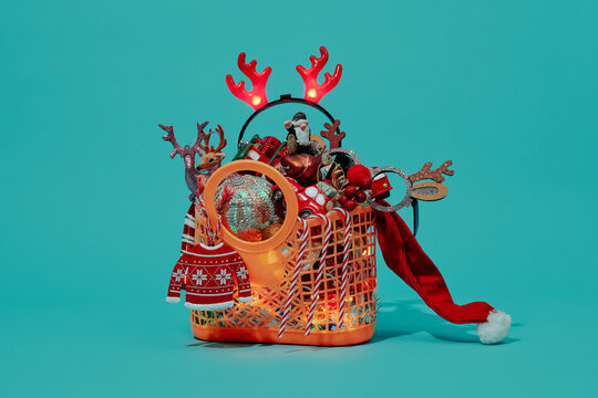 baket full of christmas ornaments